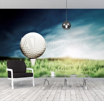 Bild på Golf ball placed on white golf tee on green grass golf course